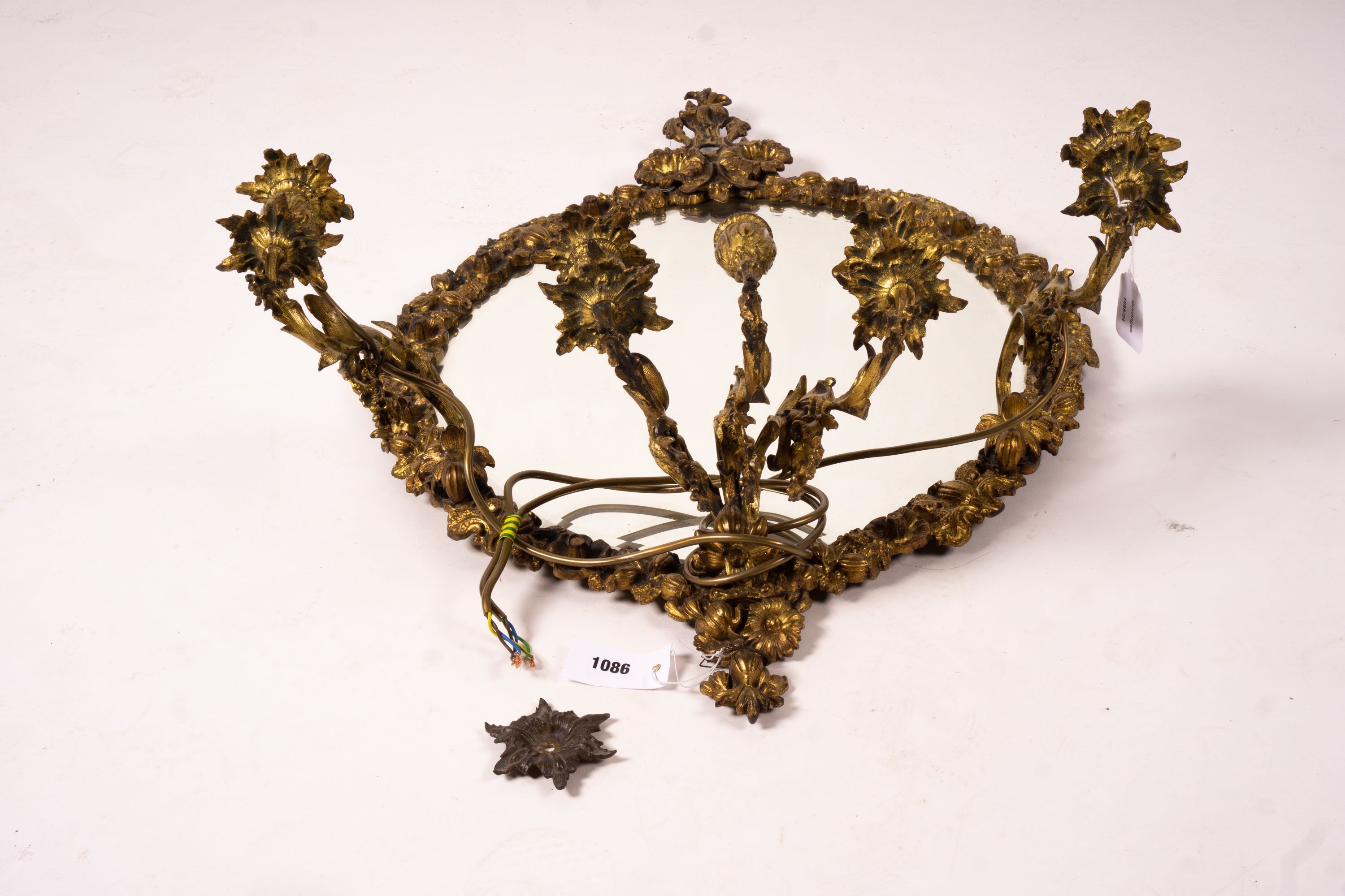 A late 19th century brass five branch girondole, width 64cm, height 84cm